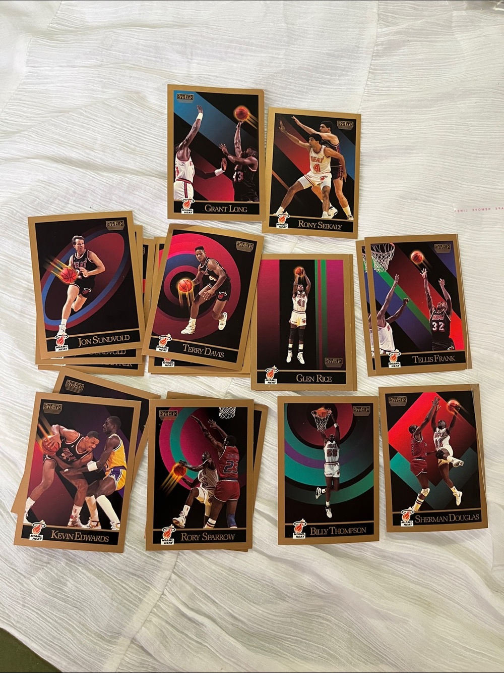 NBA Gold-Edged Basketball Trading Cards with Red, Green, Purple Accents